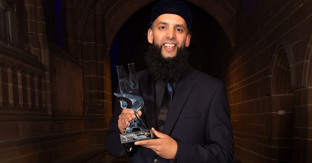 Nazim holding his NDA trophy